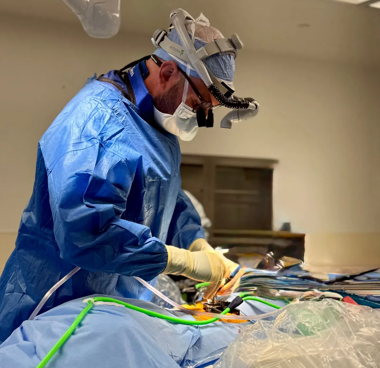 Dr. Hirsch in the operating room wearing surgical loupes