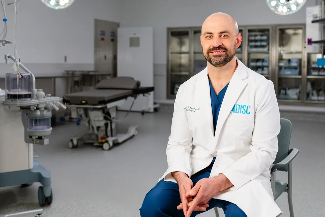 Dr. Brandon Hirsch performing minimally invasive spine surgery